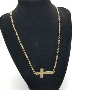 gold tone sideways cross necklace